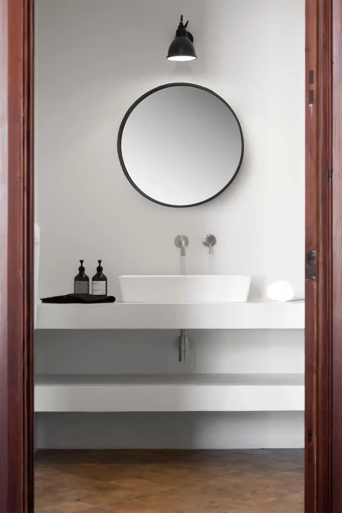 Sophisticated design bathroom in Soller, Mallorca: Our project management delivers elegance, featuring a designer sink and luxury taps.