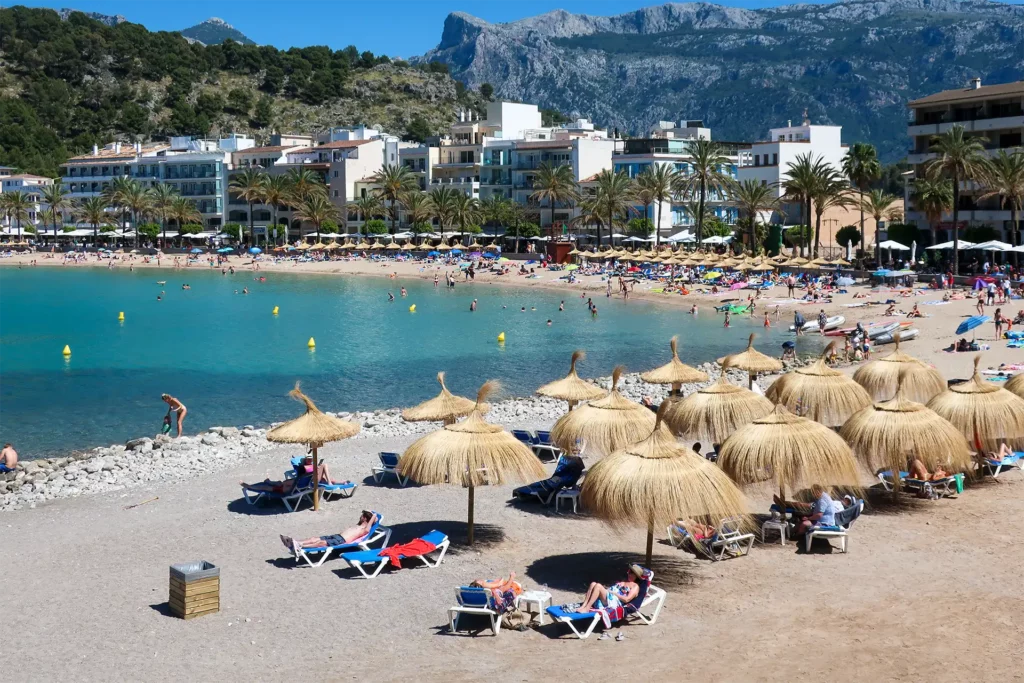 scenic view of port de soller in en epic beach side with mountains on the back in Mallorca